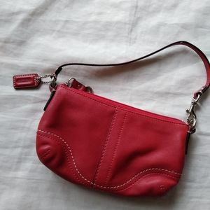 Coach small wristlet , red color